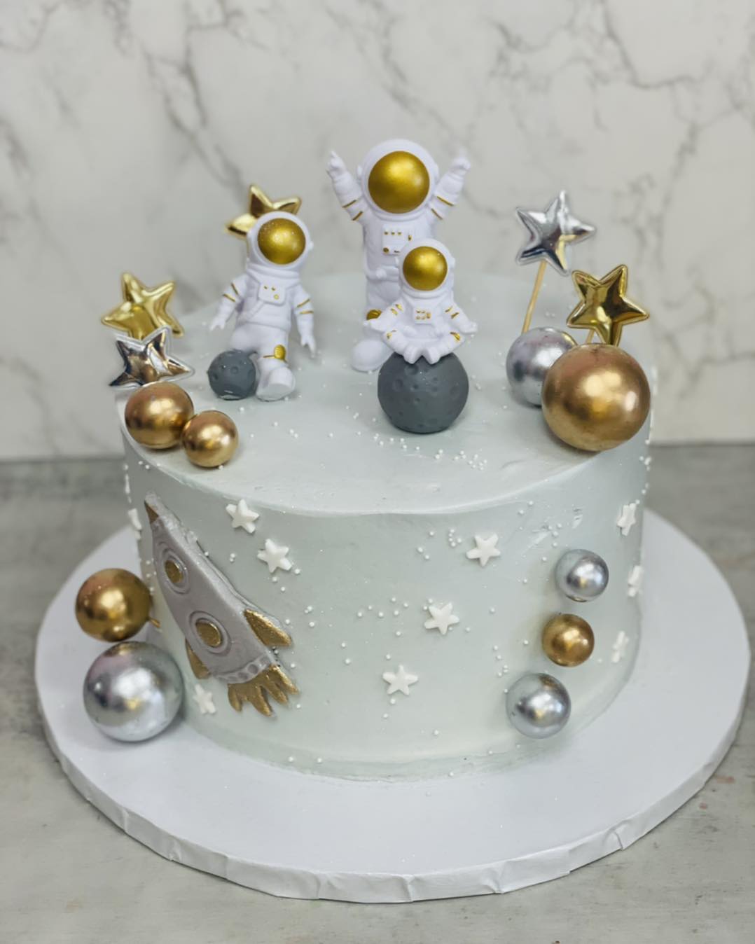 Fun space First birthday cake … love the colors on this one… we always make cosmos cakes dark...